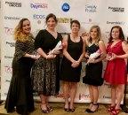 Food Lion Top Women in Grocery Winners pose with Food Lion President Meg Ham (center) at awards event in Chicago, Ill. (Photo: Business Wire)