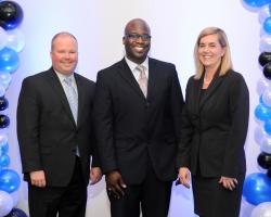 Pictured: Food Lion Senior Vice President, Retail Operations Greg Finchum; Food Lion Store Manager of the Year Antoine Grant; Food Lion President Beth Newlands Campbell
